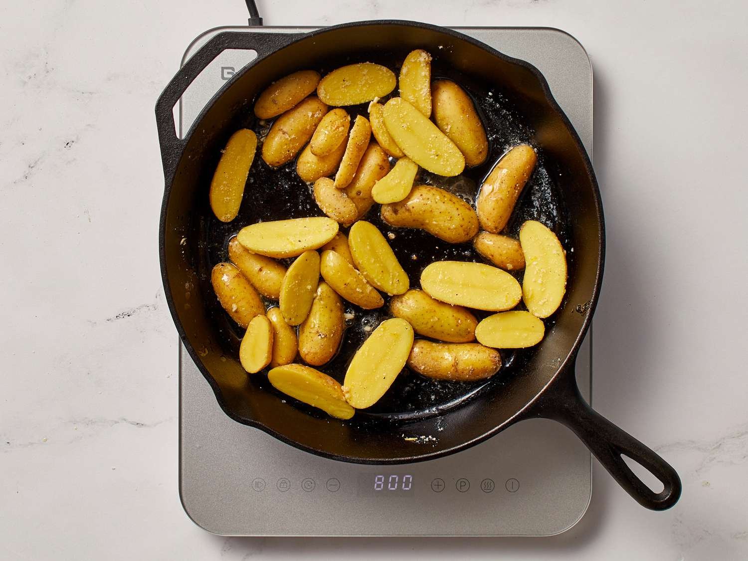 Step 3 of Roasted Garlic-Parmesan Fingerling Potatoes